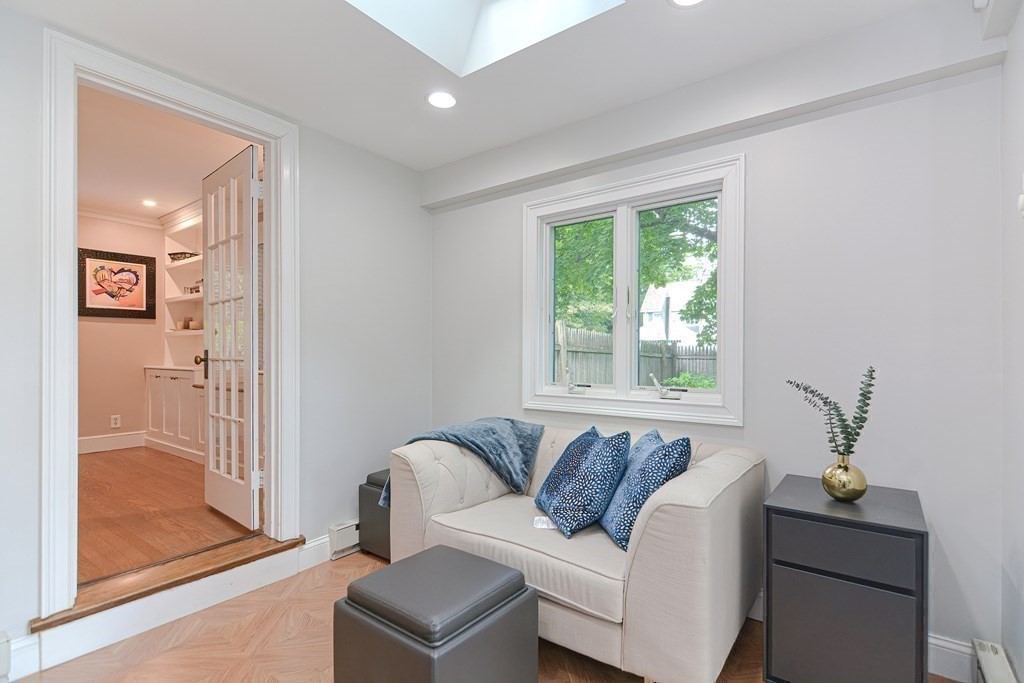2 Shirley Road Wellesley, MA 02482 - Photo 13 of 32 a living room with furniture and a window
