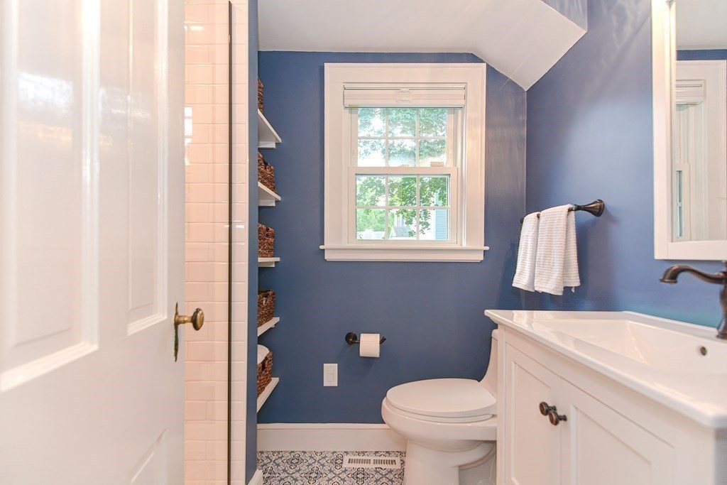 2 Shirley Road Wellesley, MA 02482 - Photo 17 of 32 a bathroom with a sink toilet and shower