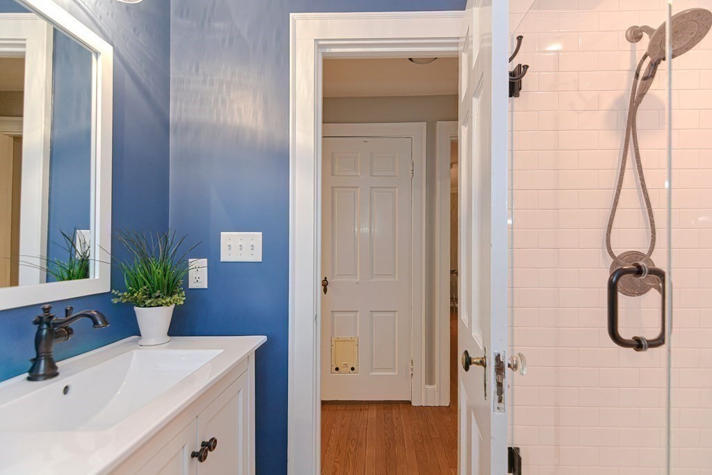 2 Shirley Road Wellesley, MA 02482 - Photo 18 of 32 a bathroom with a shower and a sink