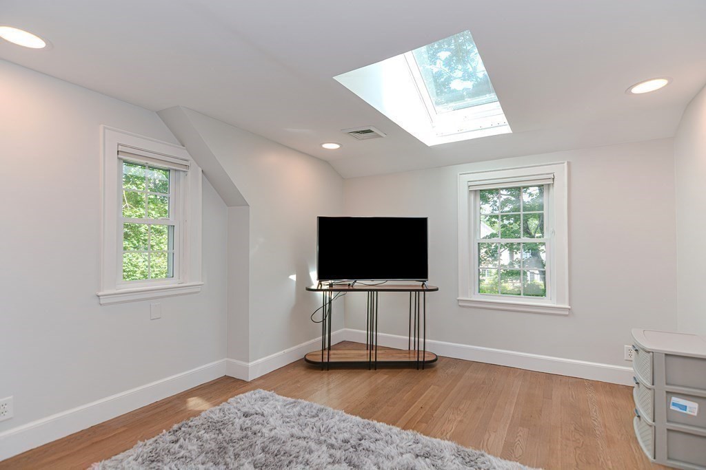 2 Shirley Road Wellesley, MA 02482 - Photo 23 of 32 a view of livingroom with furniture flat screen tv and window