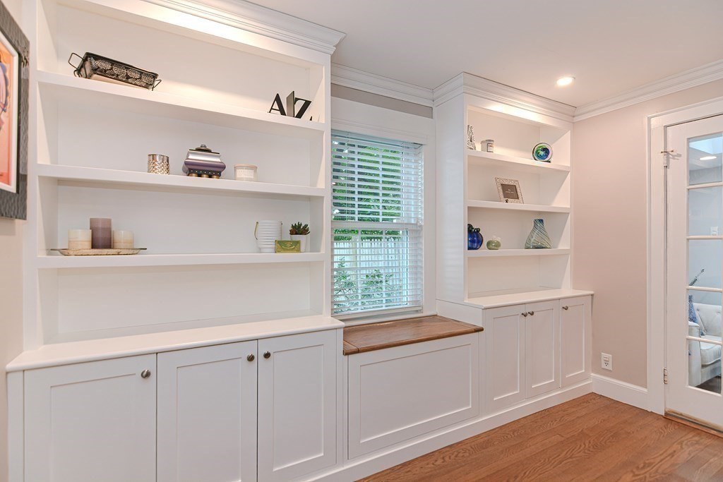 2 Shirley Road Wellesley, MA 02482 - Photo 5 of 32 a kitchen with white cabinets and wooden floor
