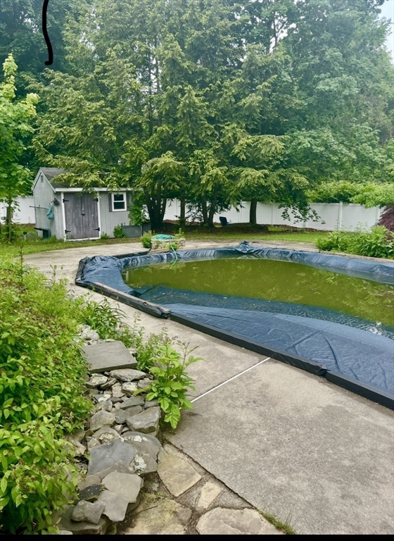 178 South Worcester Street Norton, MA 02766 - Photo 7 of 26 a view of a backyard with swimming pool