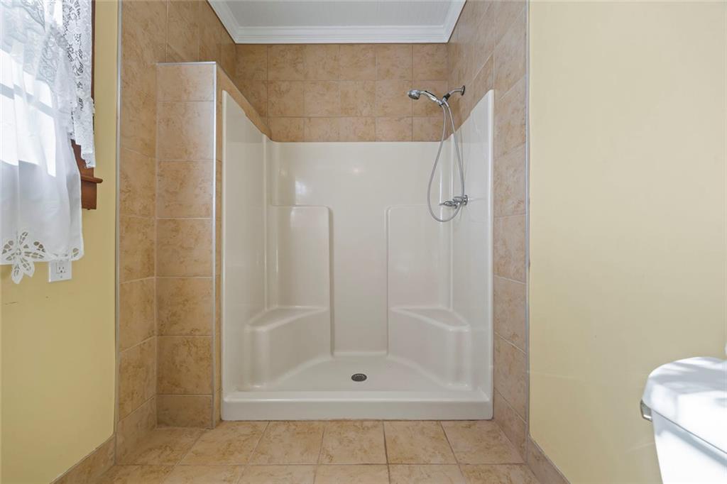 102 Mt Moriah Road Auburn, GA 30011 - Photo 14 of 44 a bathroom with a shower