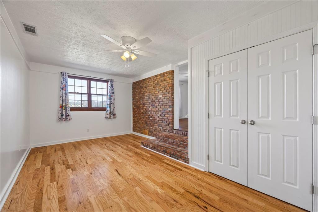 102 Mt Moriah Road Auburn, GA 30011 - Photo 23 of 44 a view of an empty room with a window