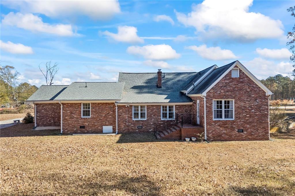 102 Mt Moriah Road Auburn, GA 30011 - Photo 24 of 44 front view of a house with a yard