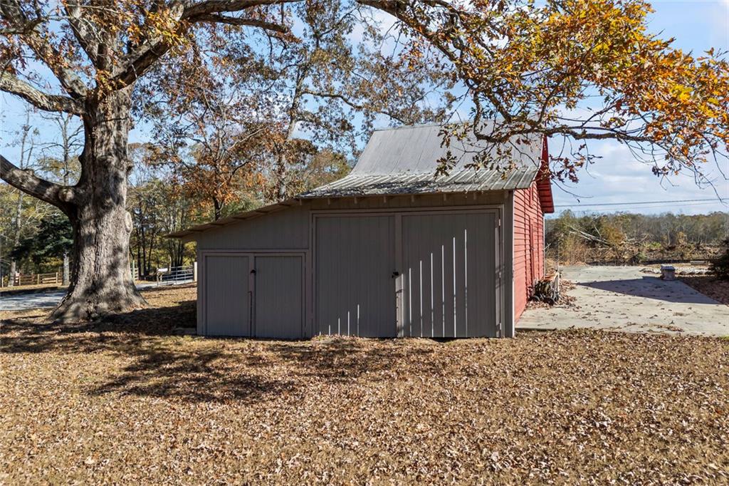 102 Mt Moriah Road Auburn, GA 30011 - Photo 30 of 44 a wooden house with a outdoor space