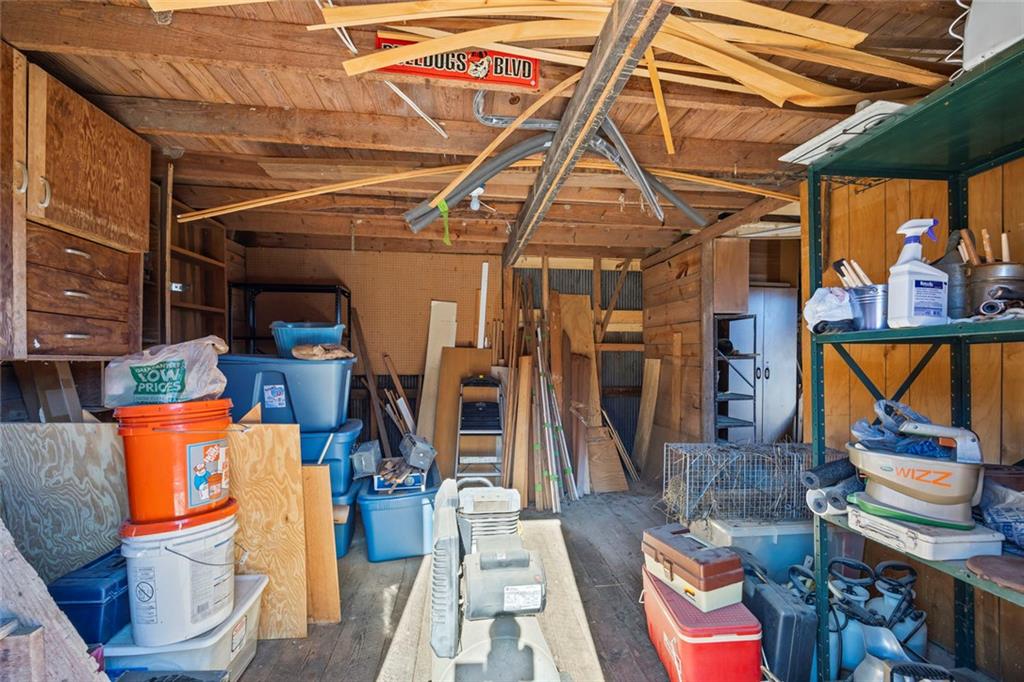 102 Mt Moriah Road Auburn, GA 30011 - Photo 36 of 44 a view of a storage room with a lot of stuff