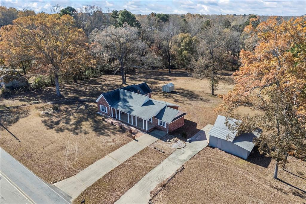 102 Mt Moriah Road Auburn, GA 30011 - Photo 4 of 44 a view of a backyard with wooden fence