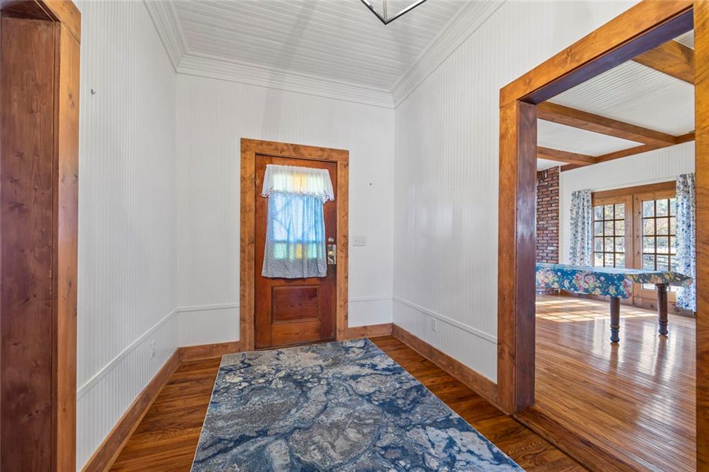102 Mt Moriah Road Auburn, GA 30011 - Photo 7 of 44 a bedroom with a bed and wooden floor