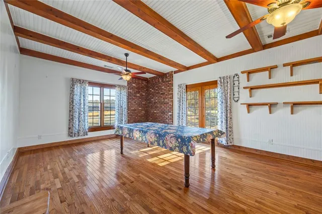 a view of livingroom with furniture window and wooden floor