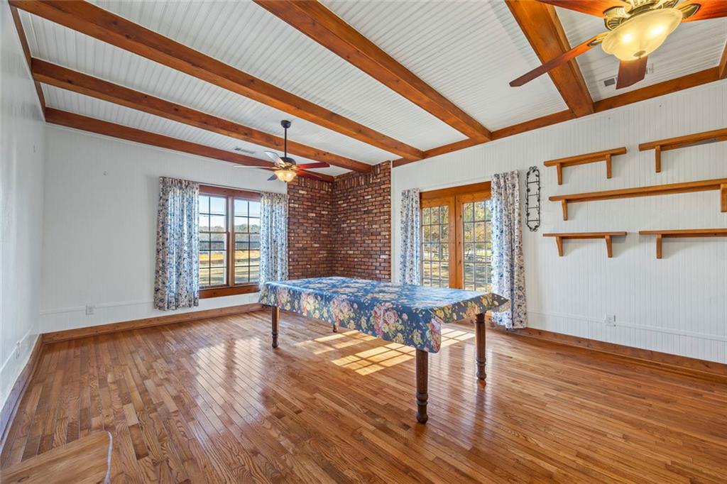 102 Mt Moriah Road Auburn, GA 30011 - Photo 8 of 44 a view of a room with wooden floor and lounge chair