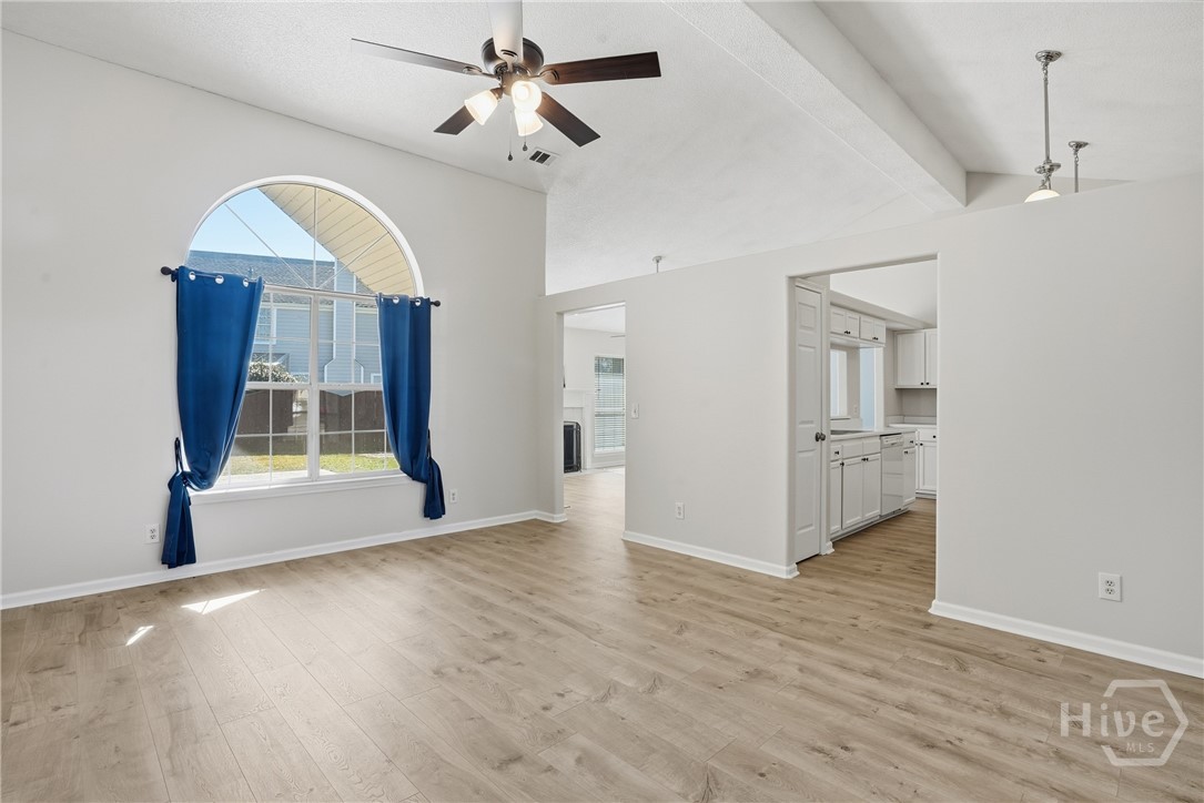 17 Mallorys Way Savannah, GA 31419 - Photo 16 of 41 Formal living room with tall ceilings and large windows