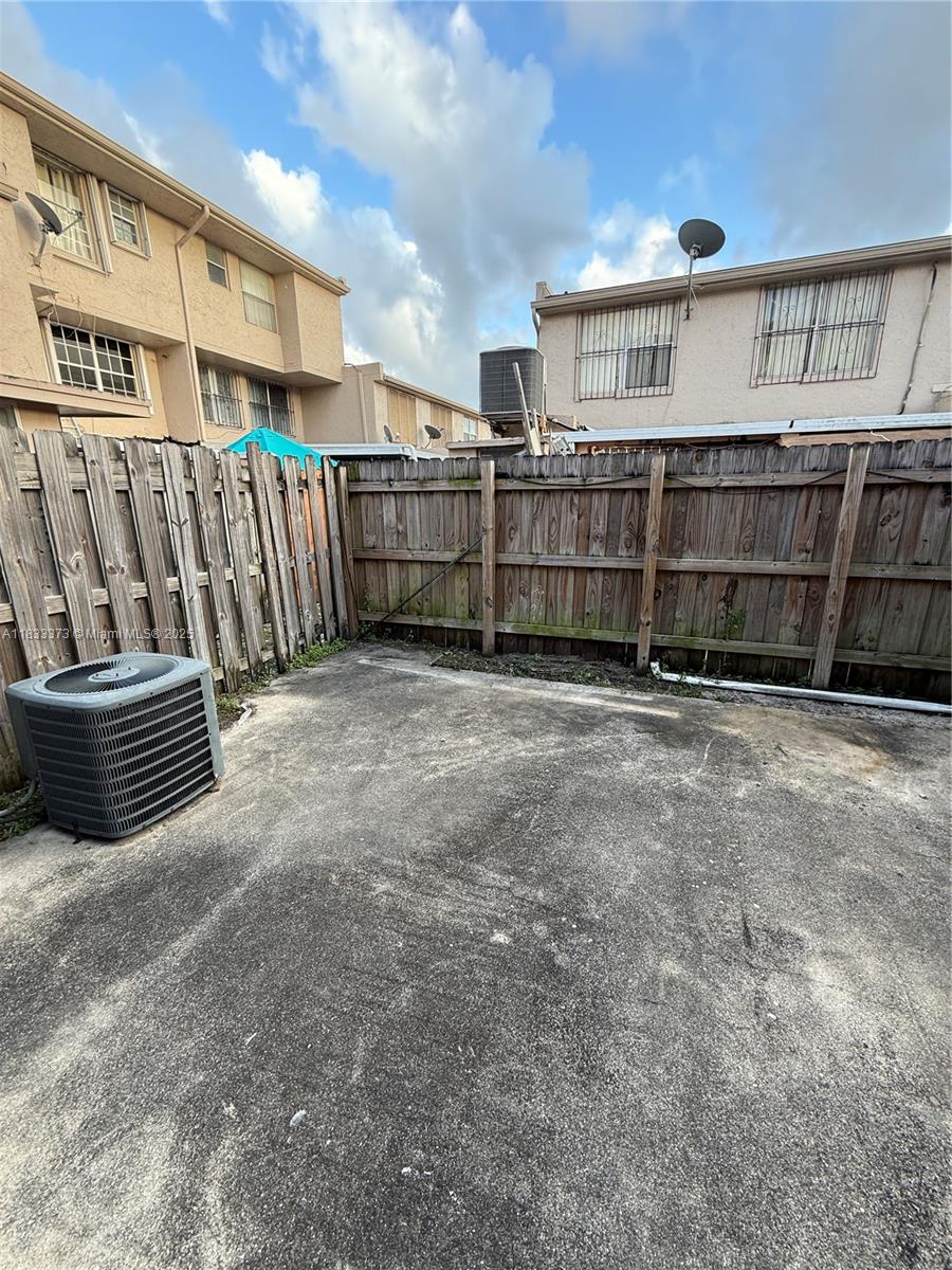 1062 West 42nd Place, Unit STUDIO Hialeah, FL 33012 - Photo 8 of 8 a view of a backyard