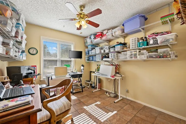 a house view with swimming pool in front of it