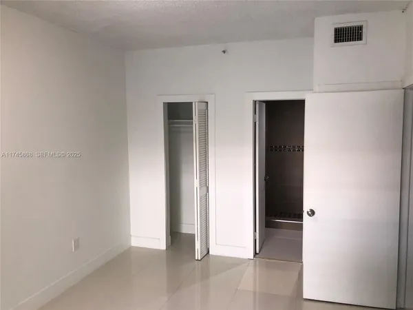 an empty room with closet