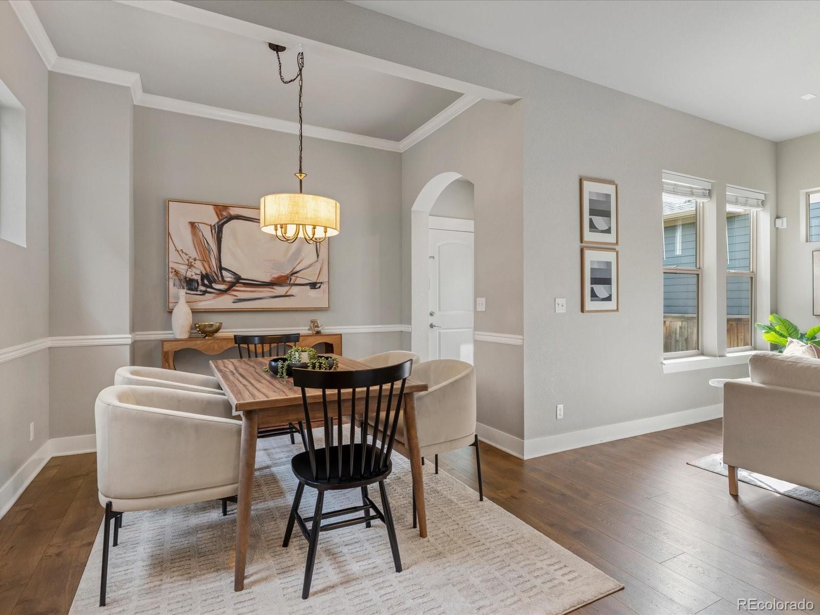 5468 Uinta Way Denver, CO 80238 - Photo 13 of 44 a dining room with furniture and window