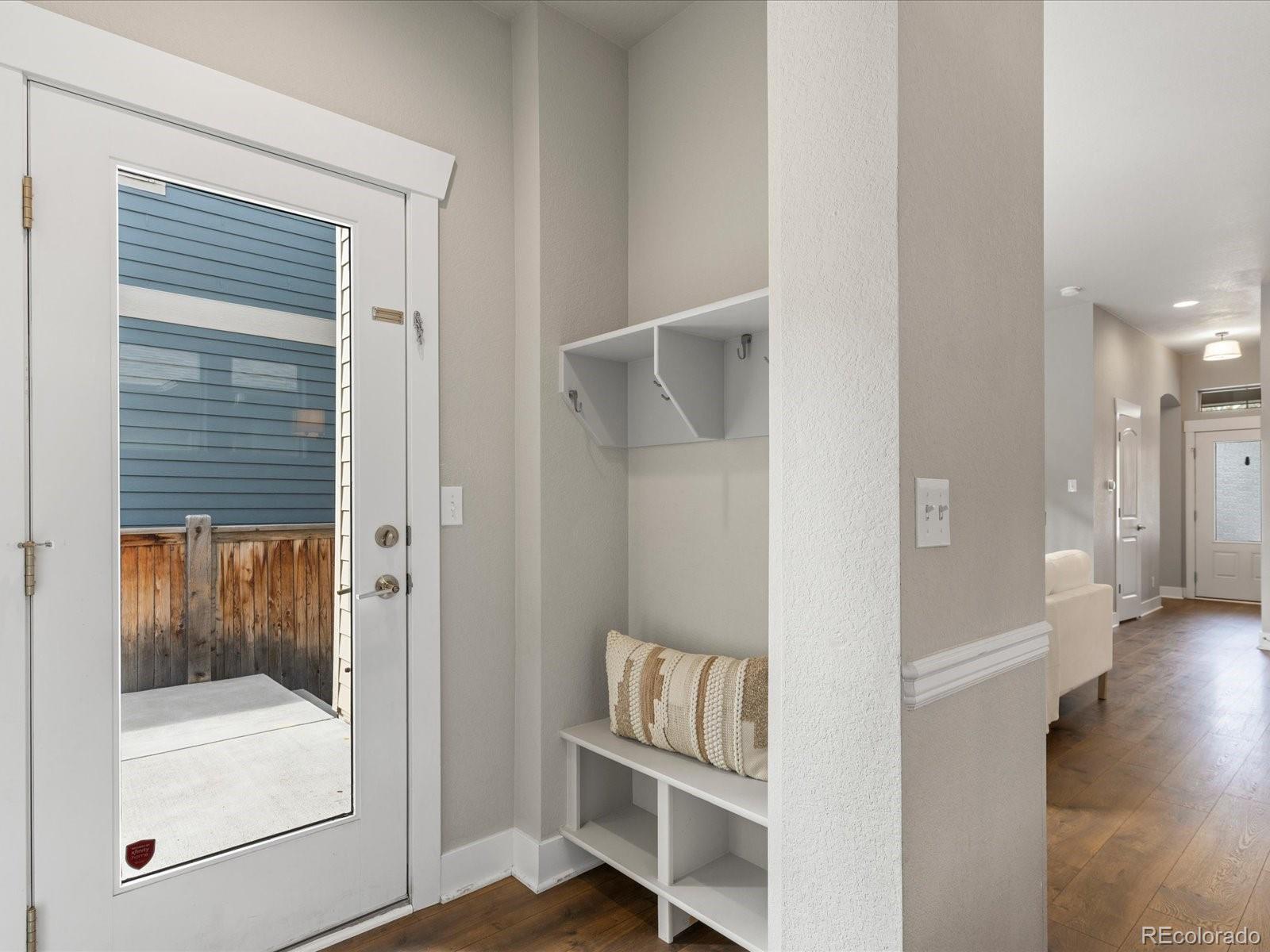 5468 Uinta Way Denver, CO 80238 - Photo 14 of 44 a view of a hallway with a elevator