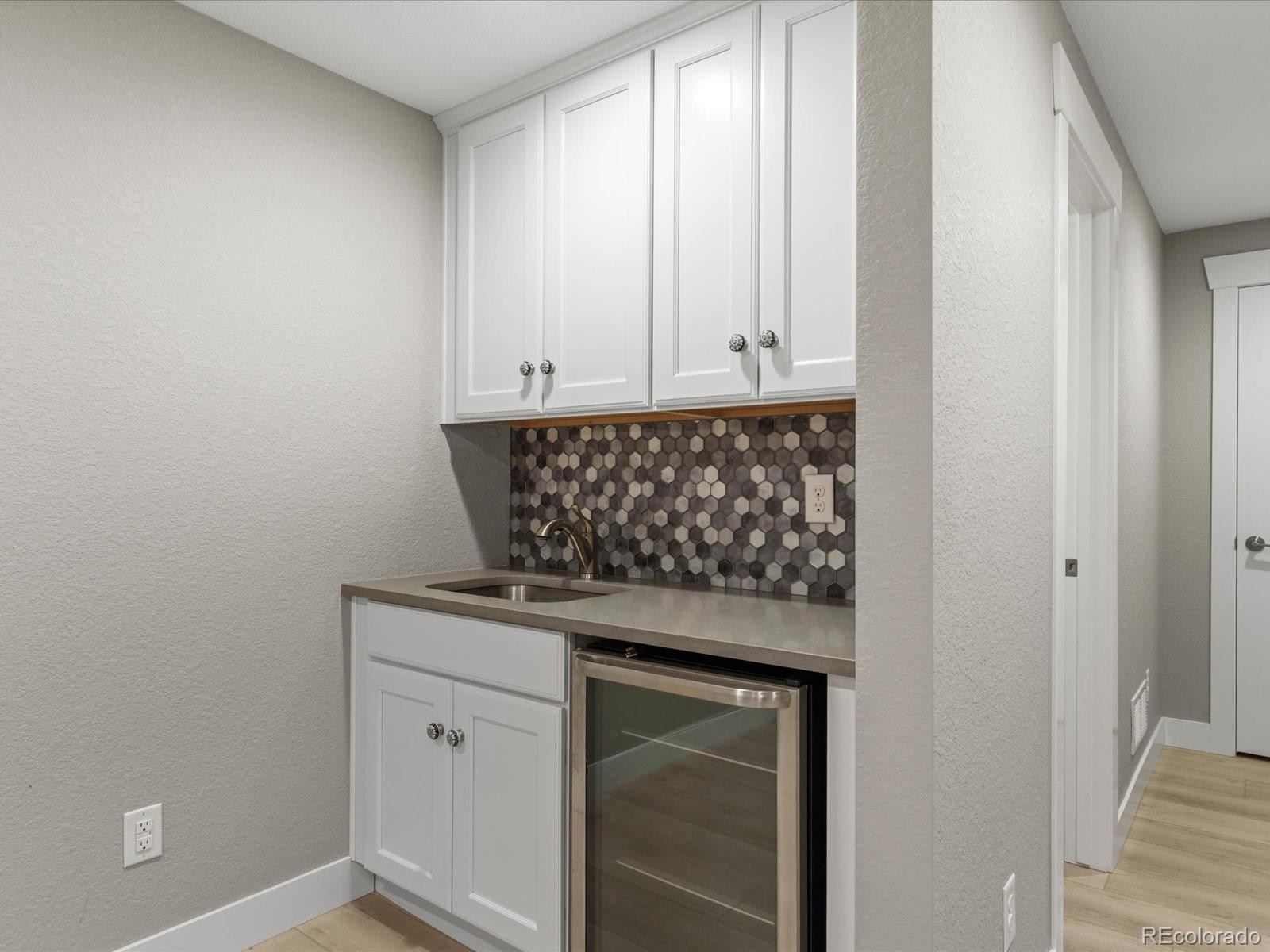 5468 Uinta Way Denver, CO 80238 - Photo 30 of 44 a view of a storage and utility room
