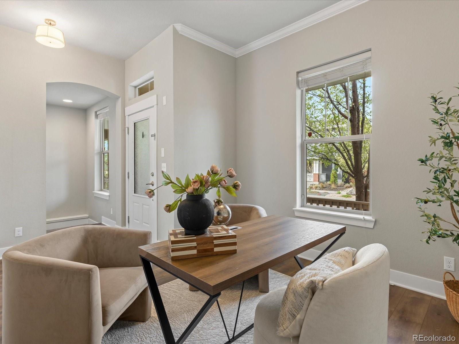 5468 Uinta Way Denver, CO 80238 - Photo 3 of 44 a living room with furniture and a window