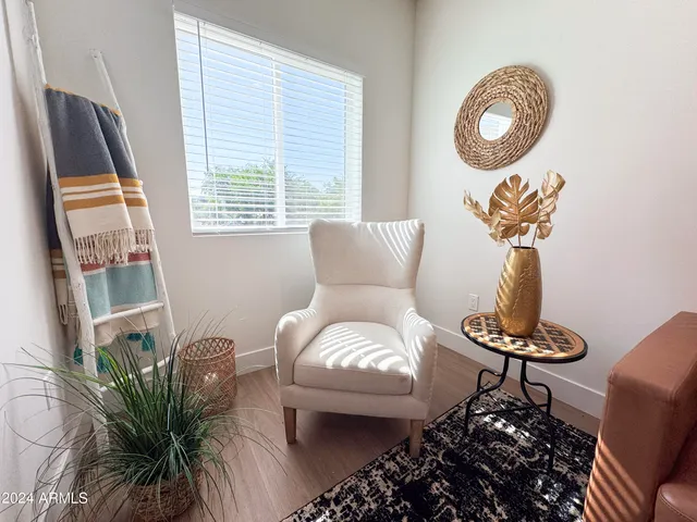 a kitchen with stainless steel appliances a sink a stove top oven a white counter space and cabinets