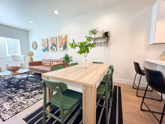 a view of a backyard with a sitting area