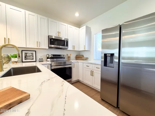 a view of a large body of water with a building in the background