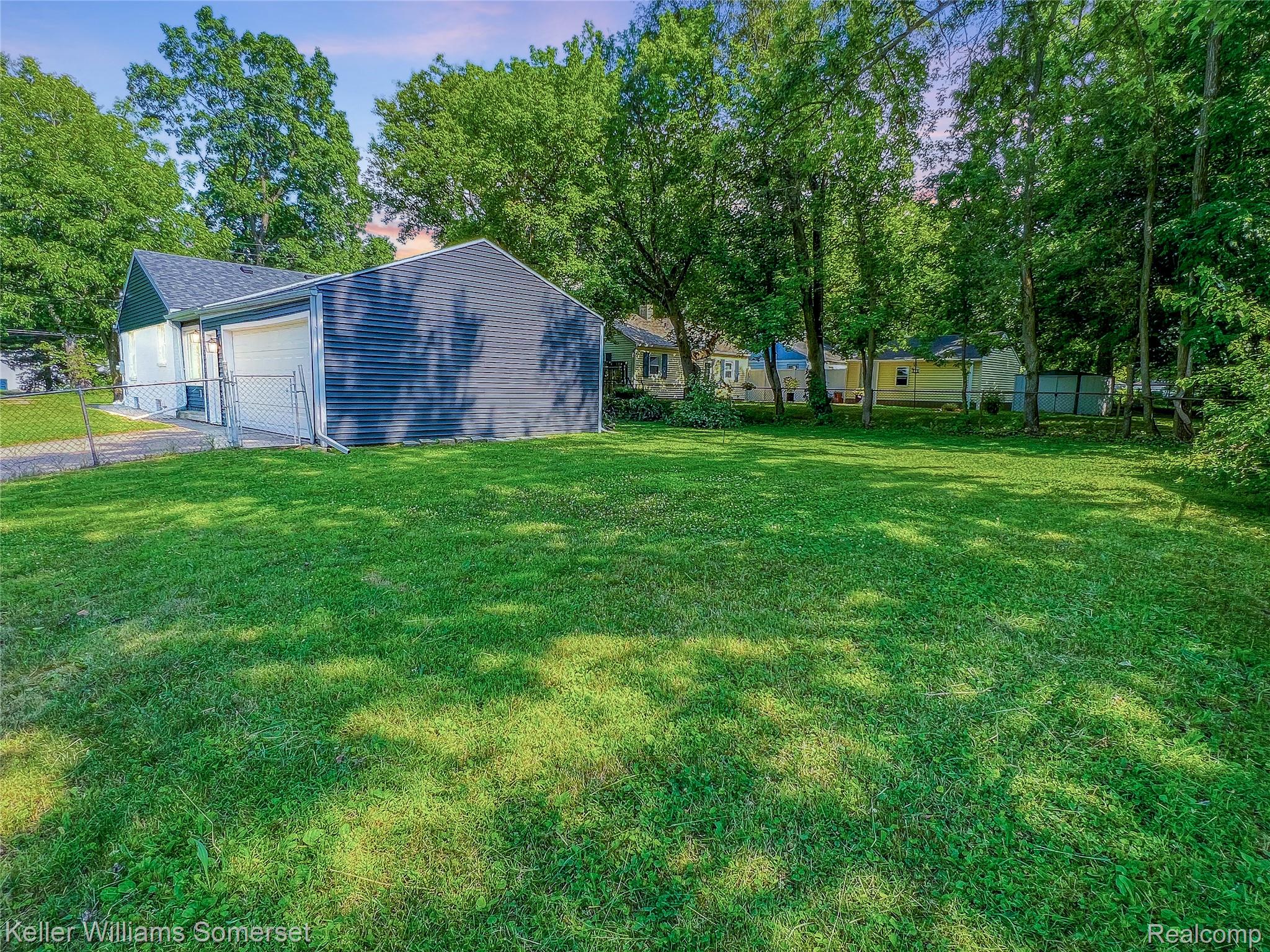 1821 Nazareth Road Kalamazoo, MI 49048 - Photo 20 of 20 Expansive green lawn with mature perimeter trees