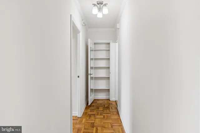 a view of a hallway with a closet