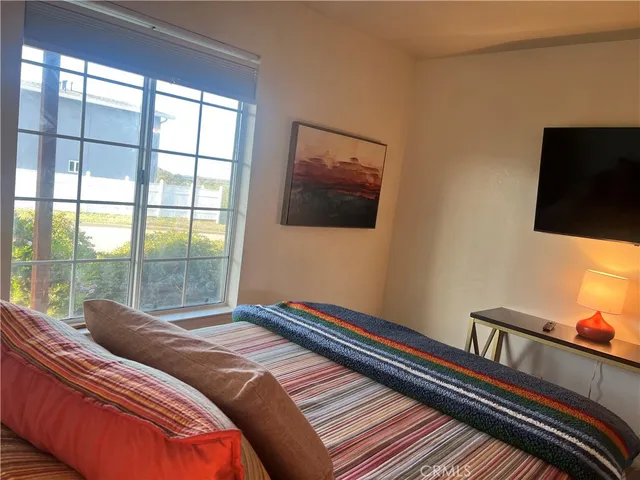 a bathroom with a double vanity sink mirror and toilet