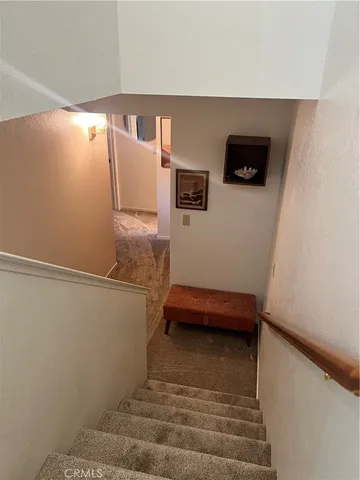 a view of entryway with stairs