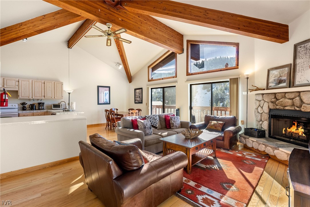 400 Fairview Boulevard, Unit 80 Incline Village, NV 89451 - Photo 1 of 23 a living room with fireplace furniture and a floor to ceiling window