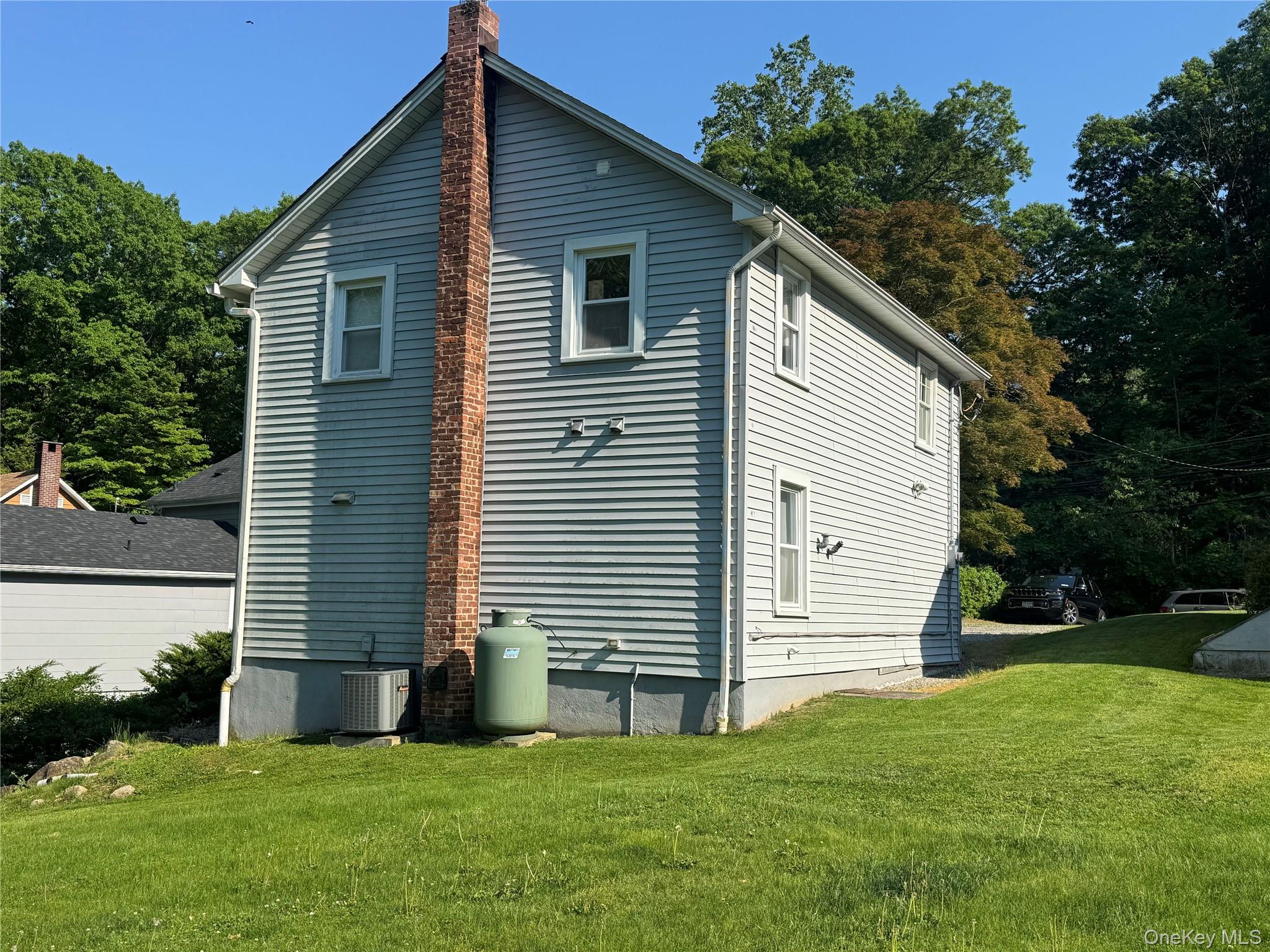 62 Whippoorwill Road East, Unit A Armonk, NY 10504 - Photo 14 of 15 Private and spacious rear yard.