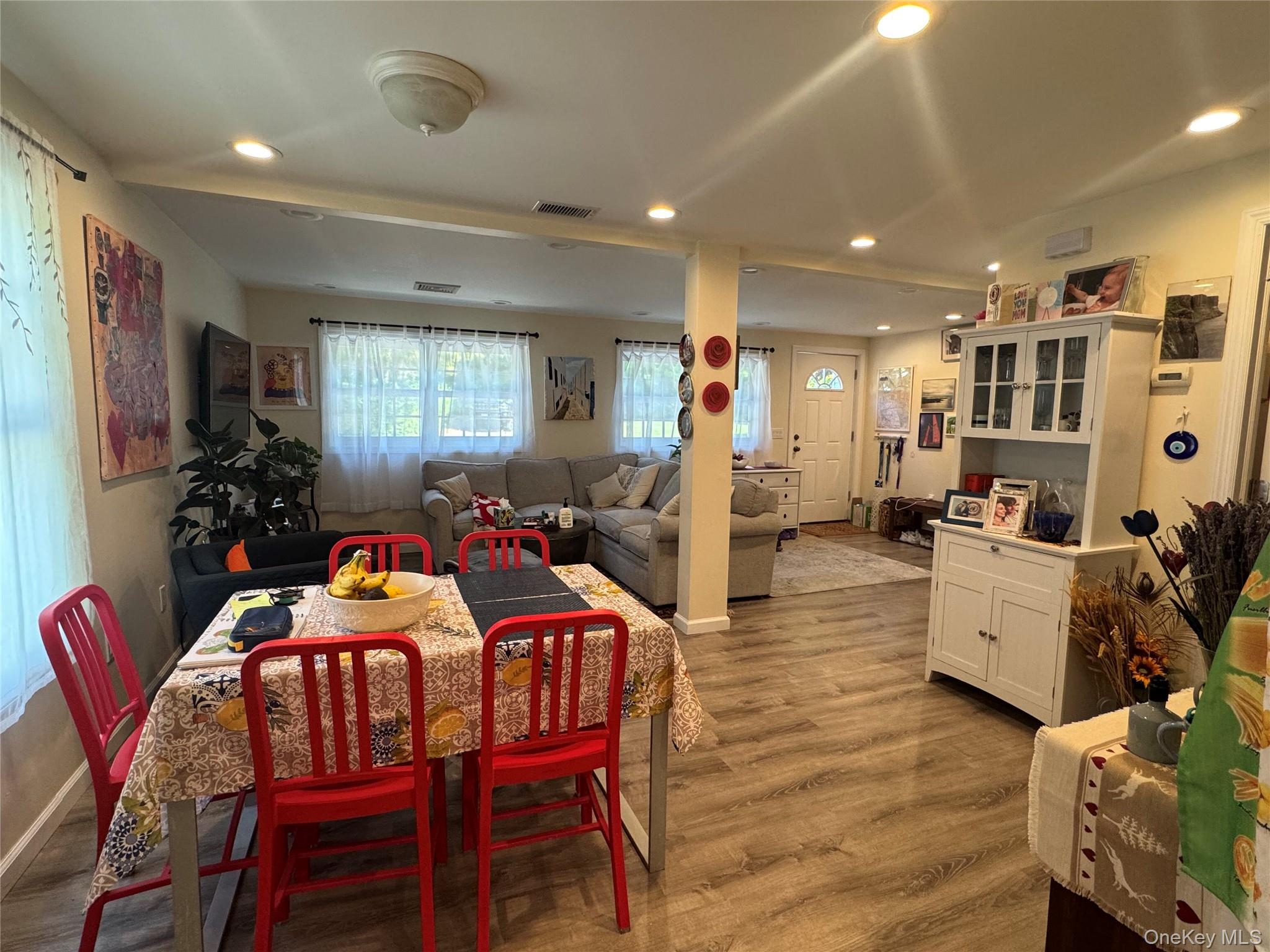 62 Whippoorwill Road East, Unit A Armonk, NY 10504 - Photo 4 of 15 Open concept Dining area and Living space with recessed lighting and beautiful flooring.