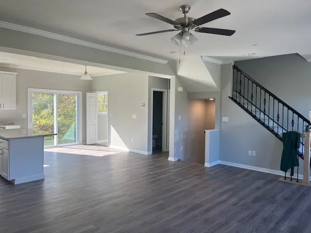 a view of room with furniture and a window