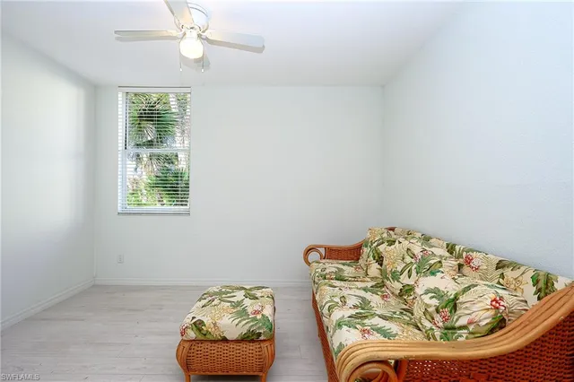 a room with furniture and a window