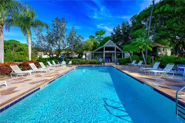 a view of a house with swimming pool