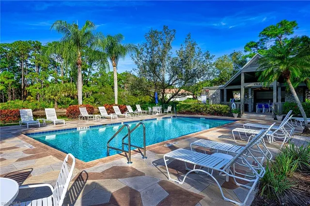 a view of a patio with swimming pool