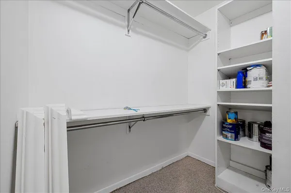 a storage room with cabinets