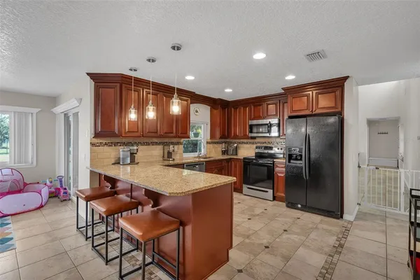 $707,000 | 6047 Shoreline Drive, Orlando, FL 32819