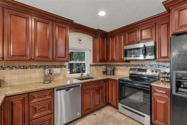 $707,000 | 6047 Shoreline Drive, Orlando, FL 32819