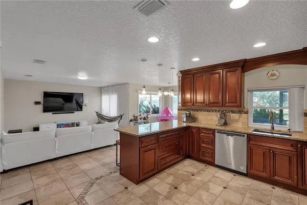 $707,000 | 6047 Shoreline Drive, Orlando, FL 32819