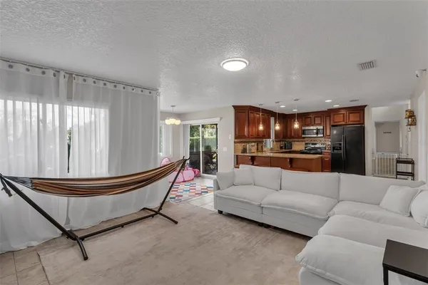 $707,000 | 6047 Shoreline Drive, Orlando, FL 32819