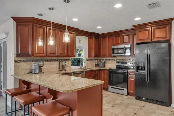 $707,000 | 6047 Shoreline Drive, Orlando, FL 32819