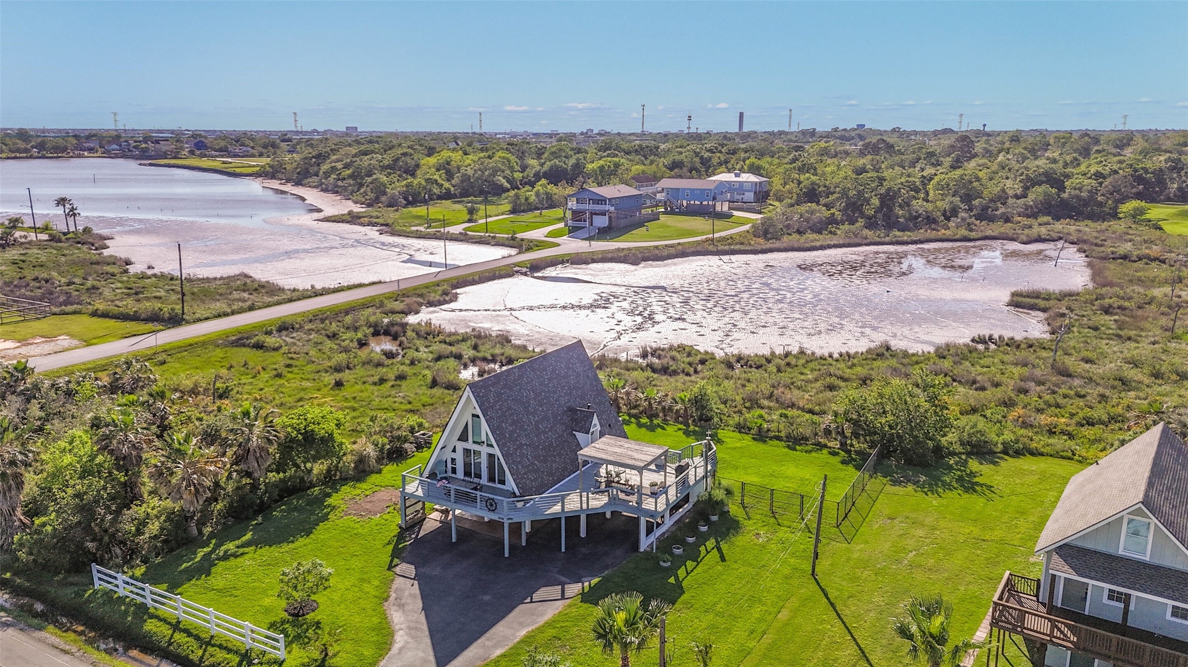2009 Todville Road Seabrook, TX 77586 - Photo 1 of 46 a view of swimming pool with lawn chairs