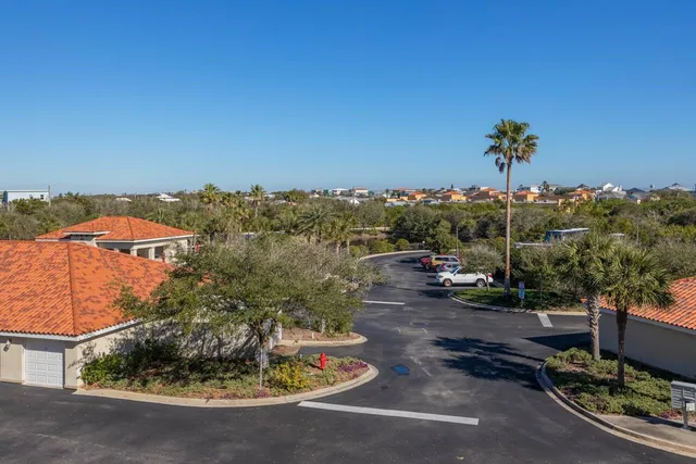a view of front door with wooden floor