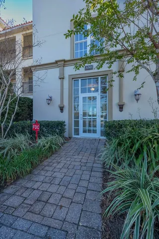a view of an empty room with a fireplace