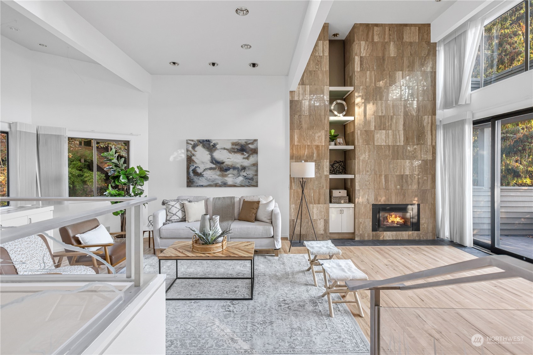 436 36th Avenue Seattle, WA 98122 - Photo 18 of 39 a living room with furniture a fireplace and a table with wooden floor