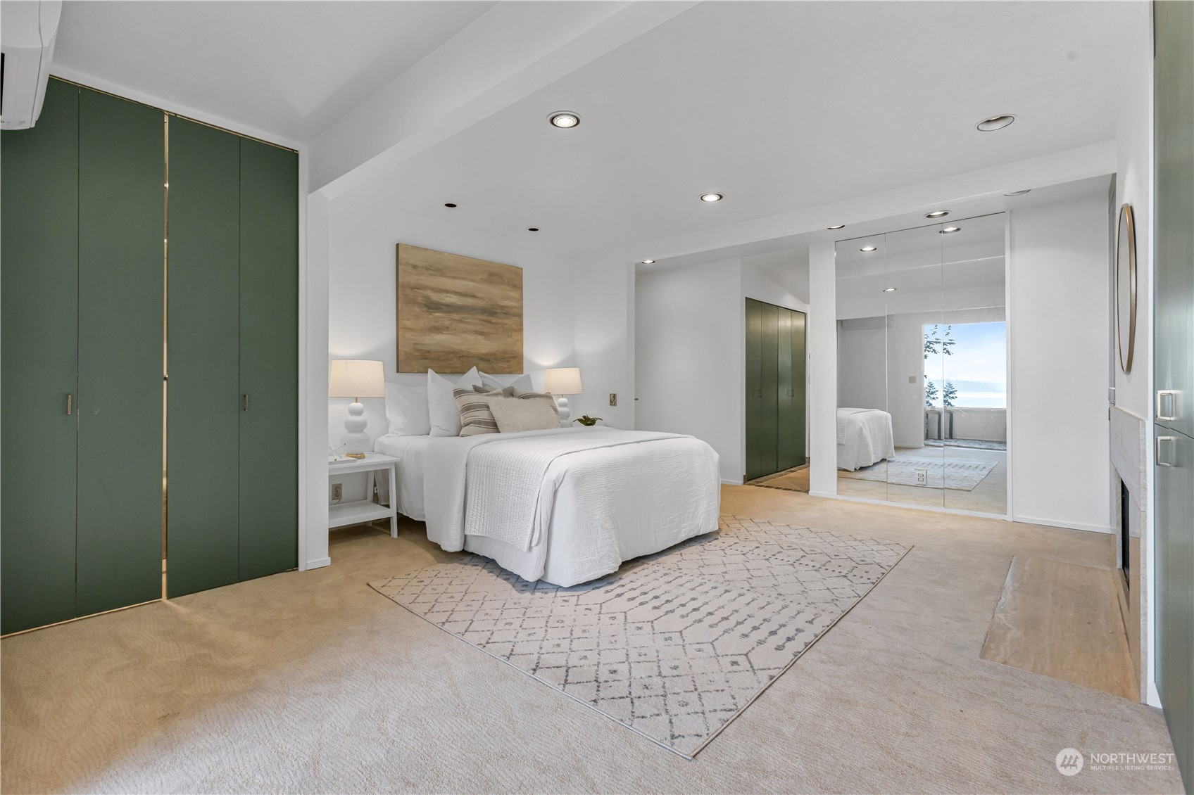 436 36th Avenue Seattle, WA 98122 - Photo 23 of 39 a bedroom with a large bed and a mirror