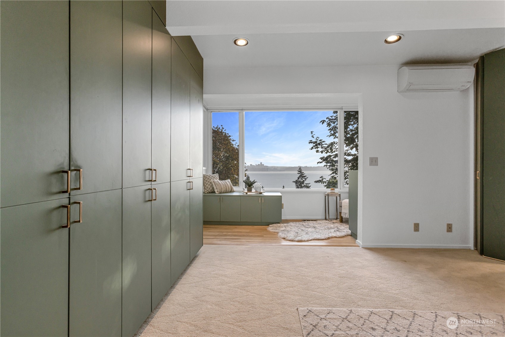 436 36th Avenue Seattle, WA 98122 - Photo 24 of 39 a view of a hallway with cabinet and a bathroom