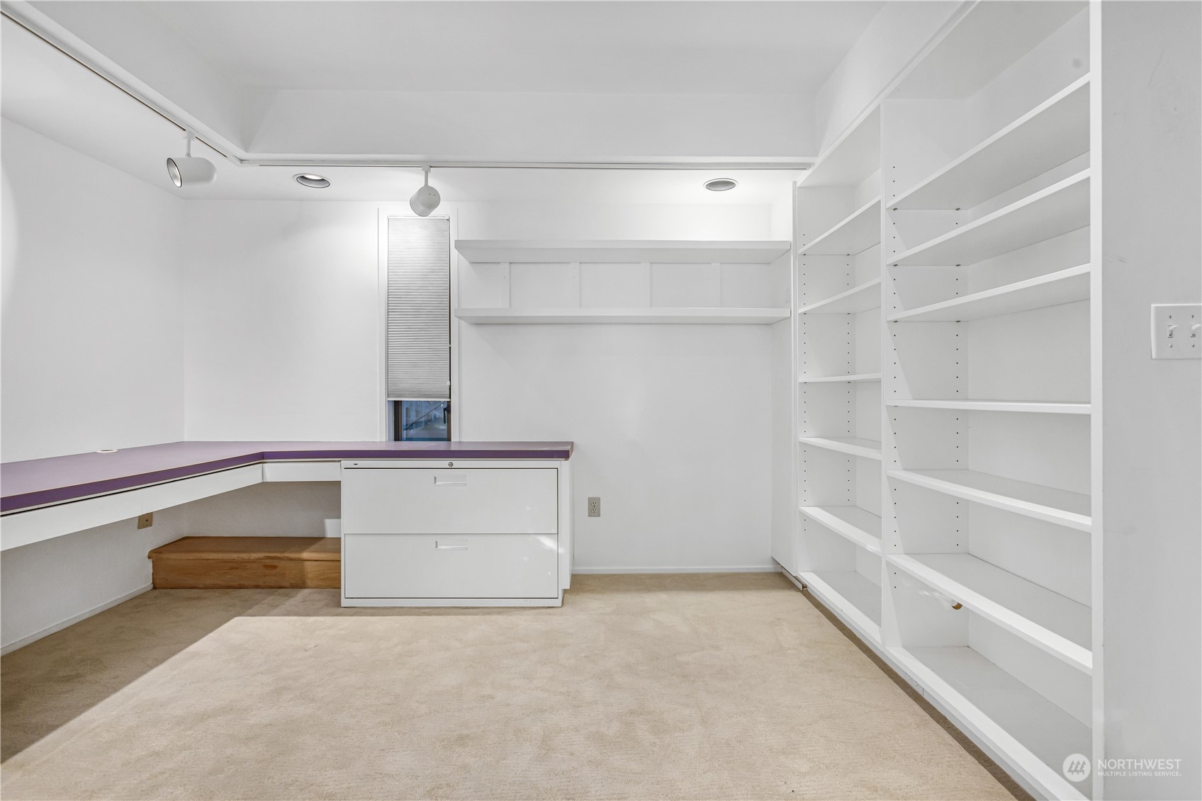 436 36th Avenue Seattle, WA 98122 - Photo 27 of 39 a view of an empty walk in closet